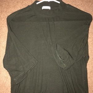 Green turtle neck crop top.